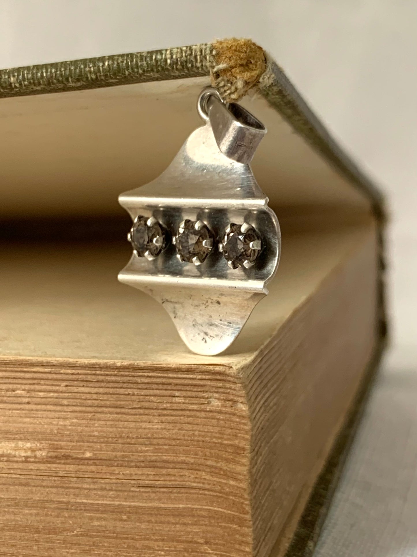 .925 1960s Elis Kauppi Kupittaan Kulta Finland solid silver modernist Smoky Smokey Quartz gemstone geometric Finish MCM designer pendant.