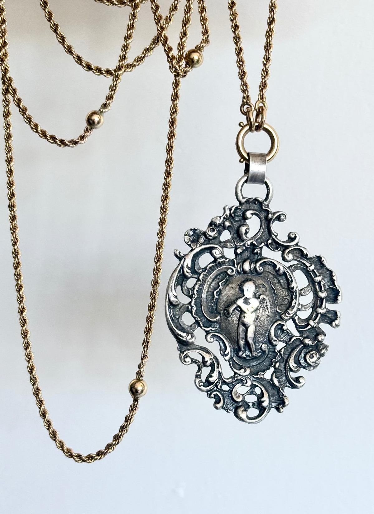 .1896 .925 antique Baroque revival left angel trumpet playing cherub filigree large sterling silver Victorian hallmarked silver pendant