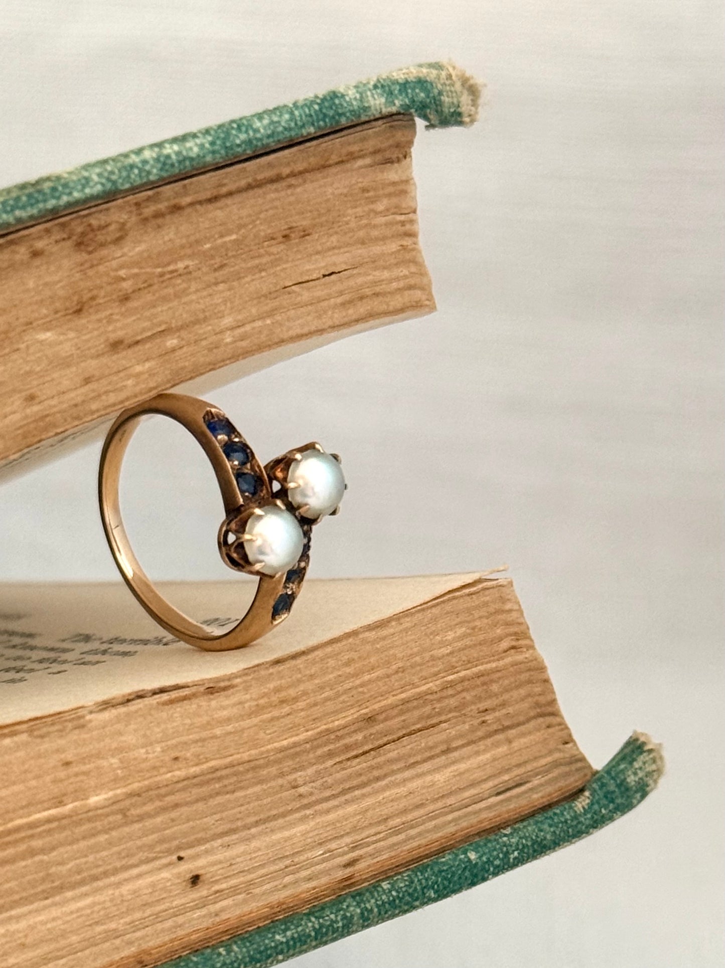 .14ct .1880s .1900s .585 gold antique Victorian Edwardian treasure Toi et Moi double pearl and sapphire bypass sweetheart commitment ring