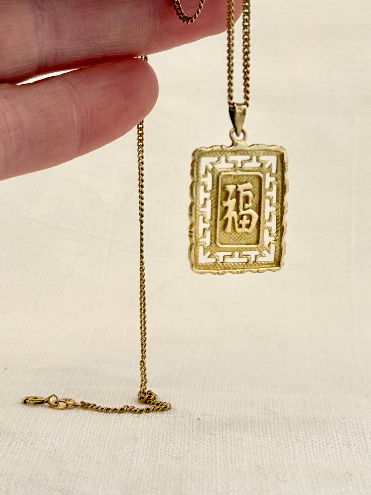.14ct .1960s .1970s .545 Chinese Good luck and Longevity double sided high carat yellow golden token pendant